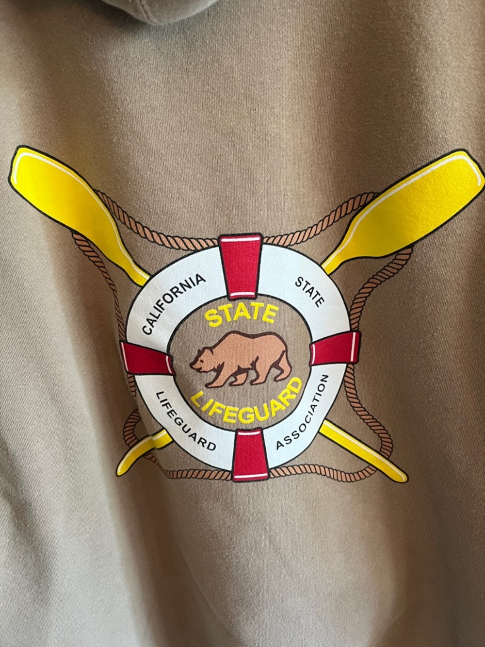 Men's Beige Cali Guard Pullover Hoodie with Small California Lifeguard Bear